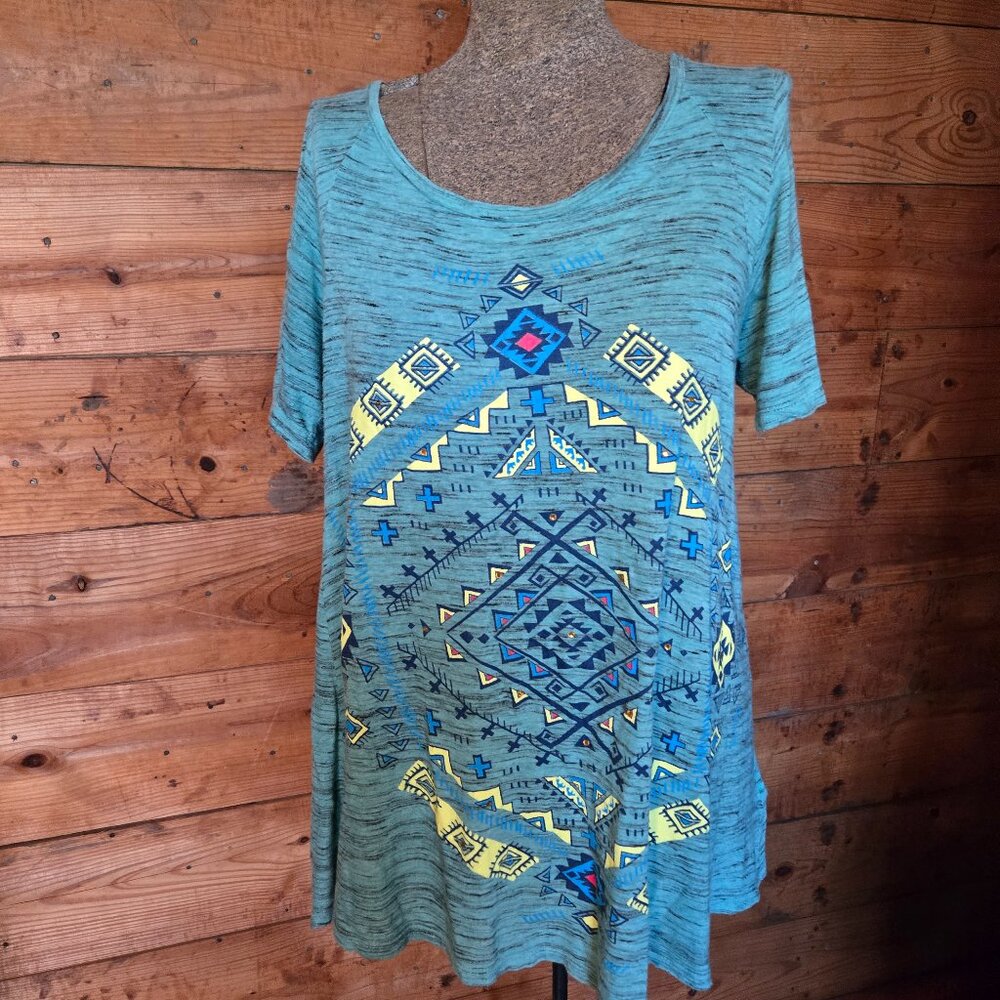 Seafoam green with southwest design, short sleeve t-shirt with woven upper back.